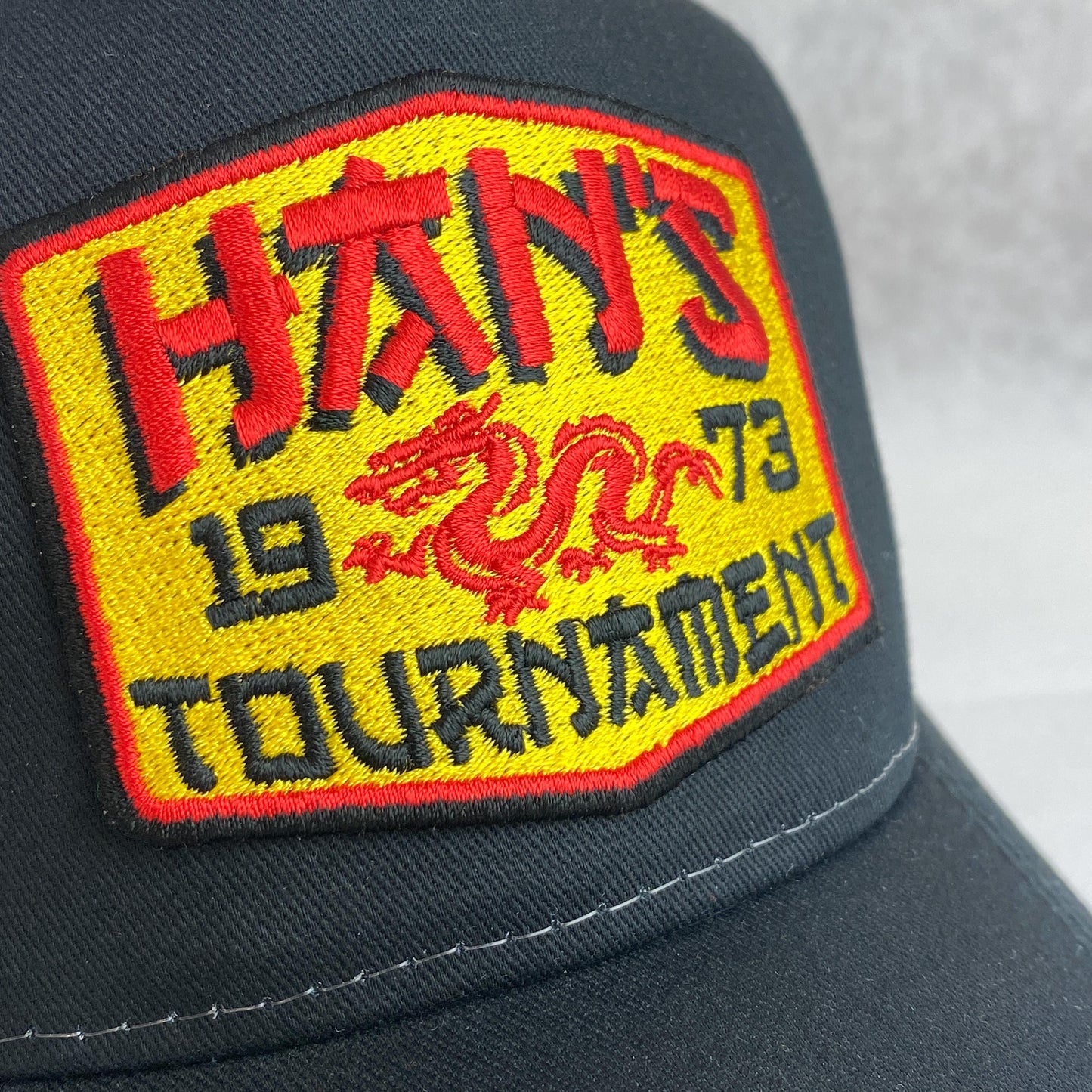 Han's Tournament 1973 Trucker Hat