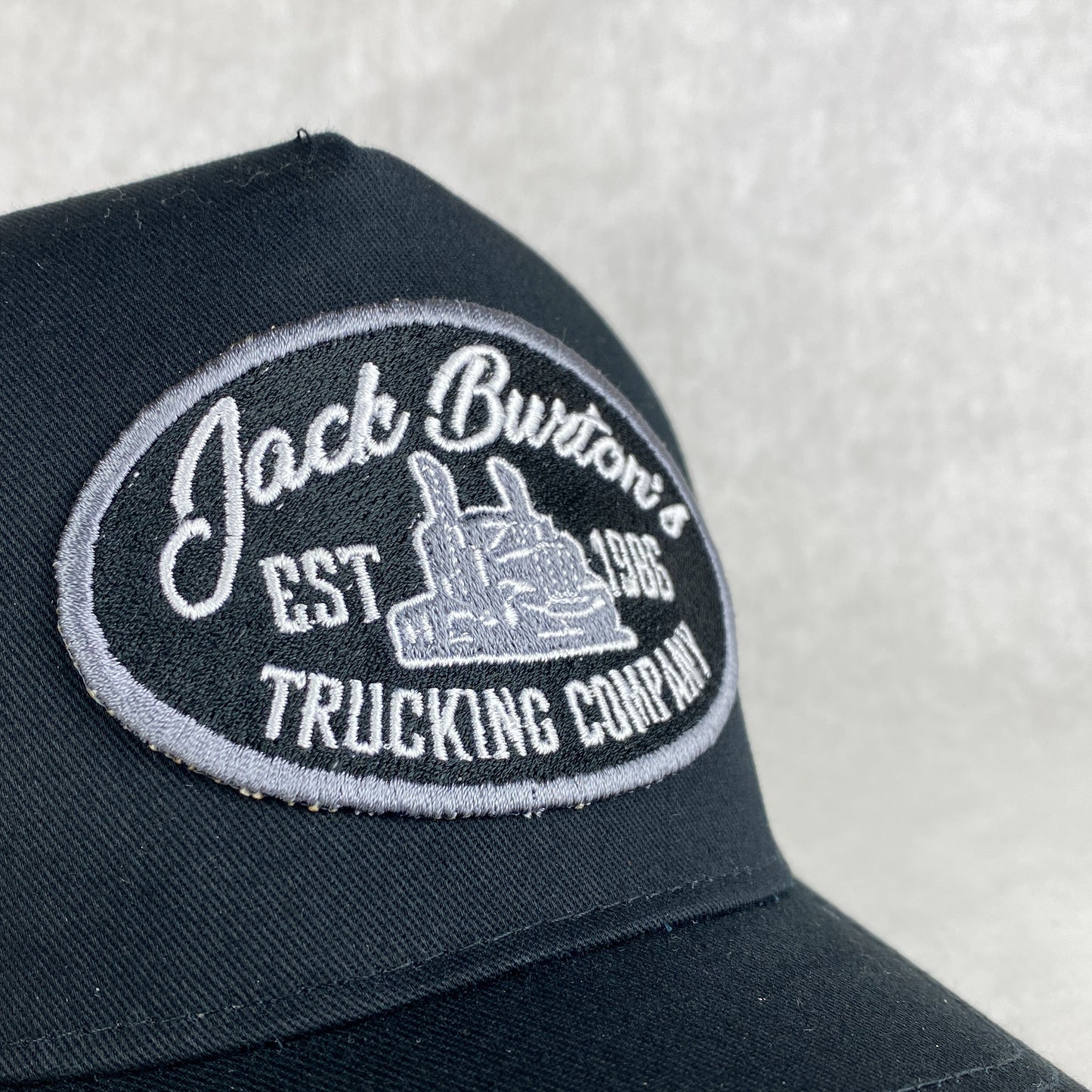 Jack Burton's Trucker Co embroidered retro trucker cap