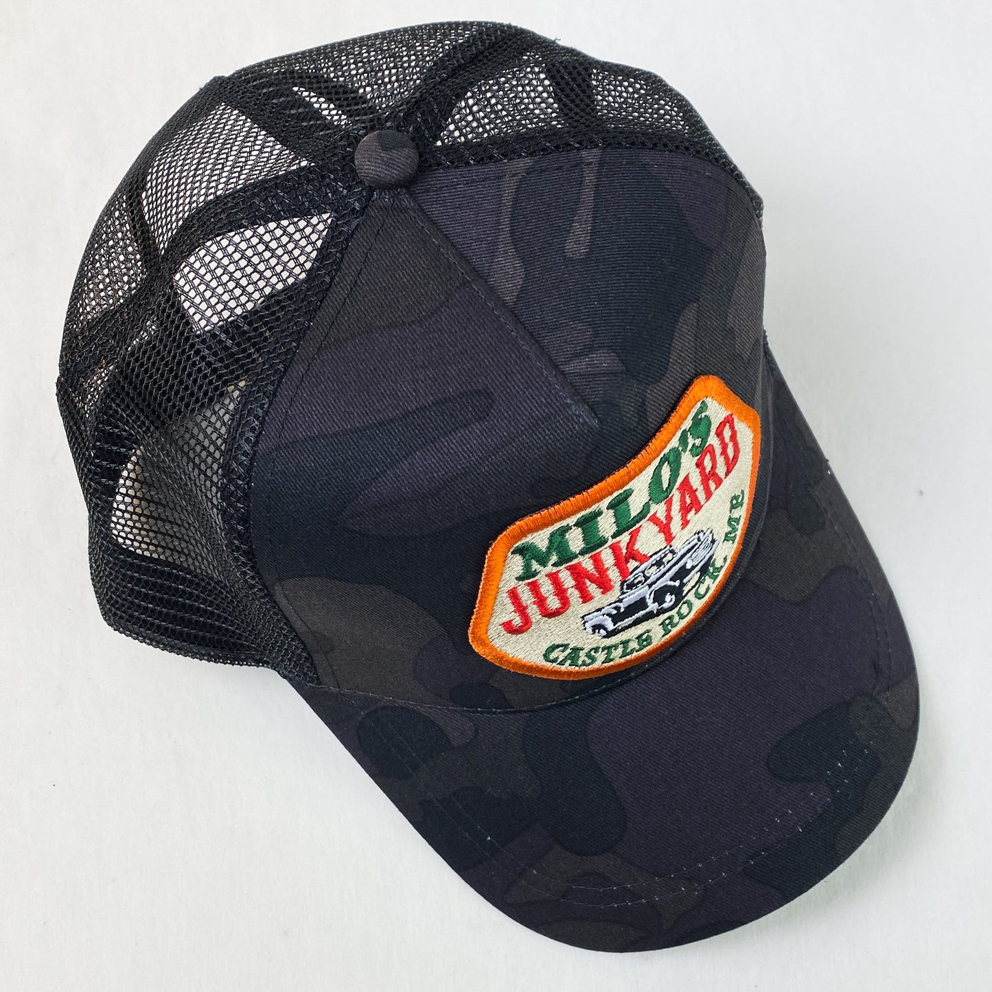 Milo's Junkyard from Stand By Me retro embroidered trucker cap