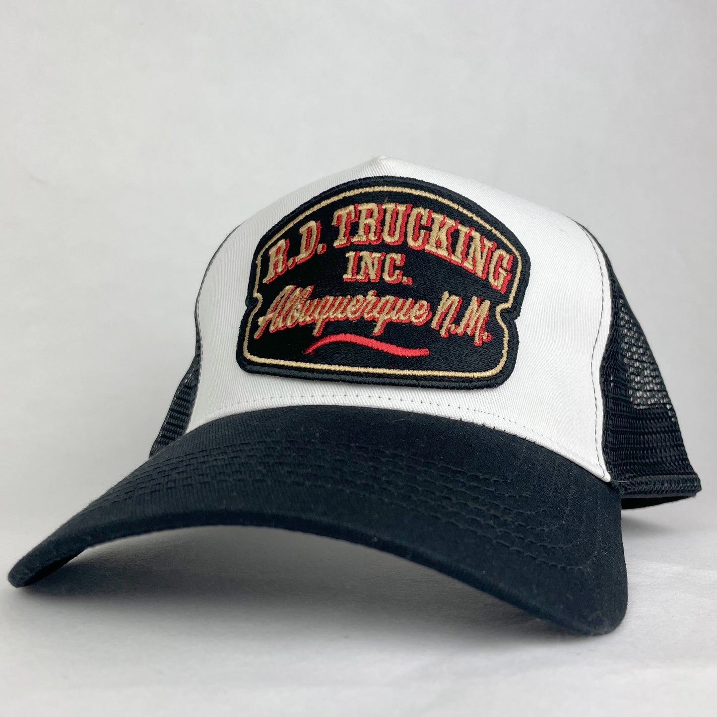 Trucker hat with a patch on a white background