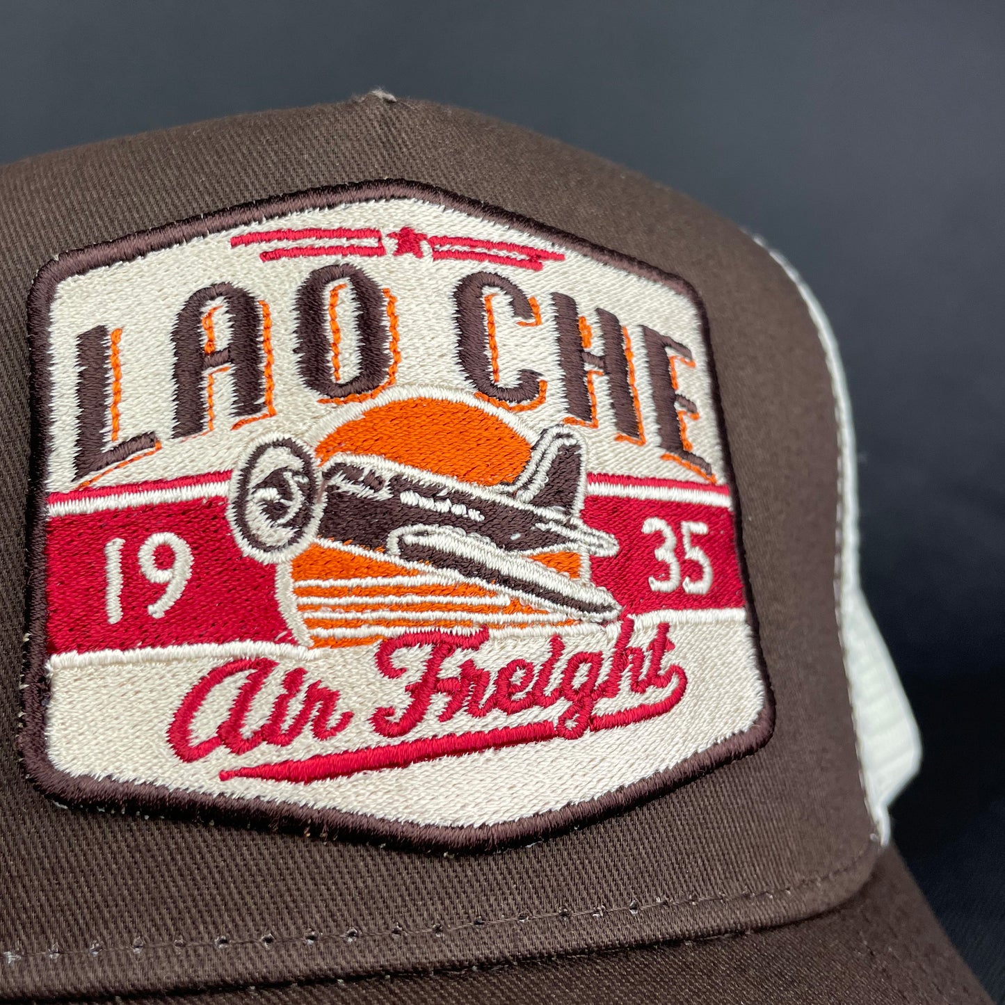 Lao Che Air Freight Trucker Hat