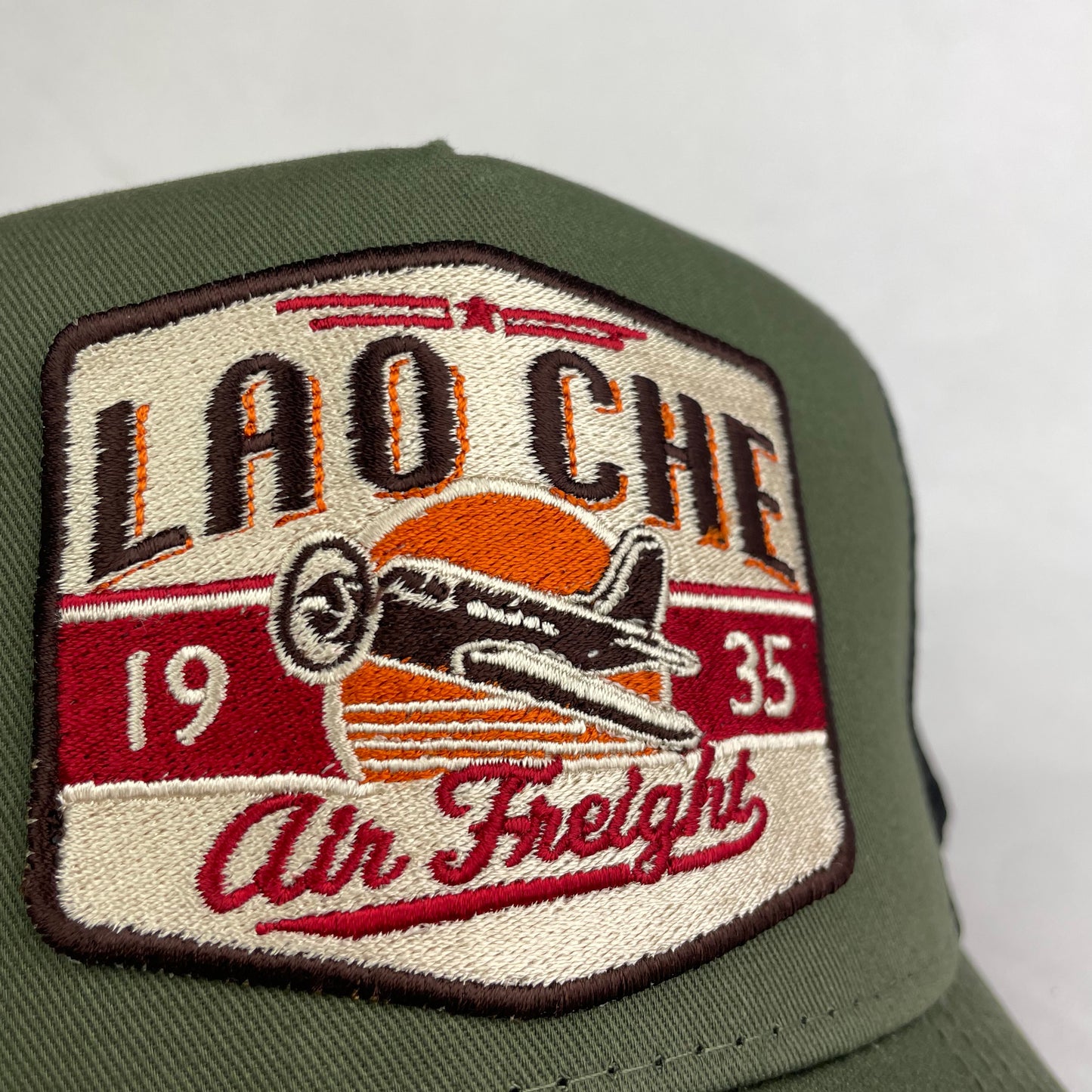 Lao Che Air Freight Trucker Hat
