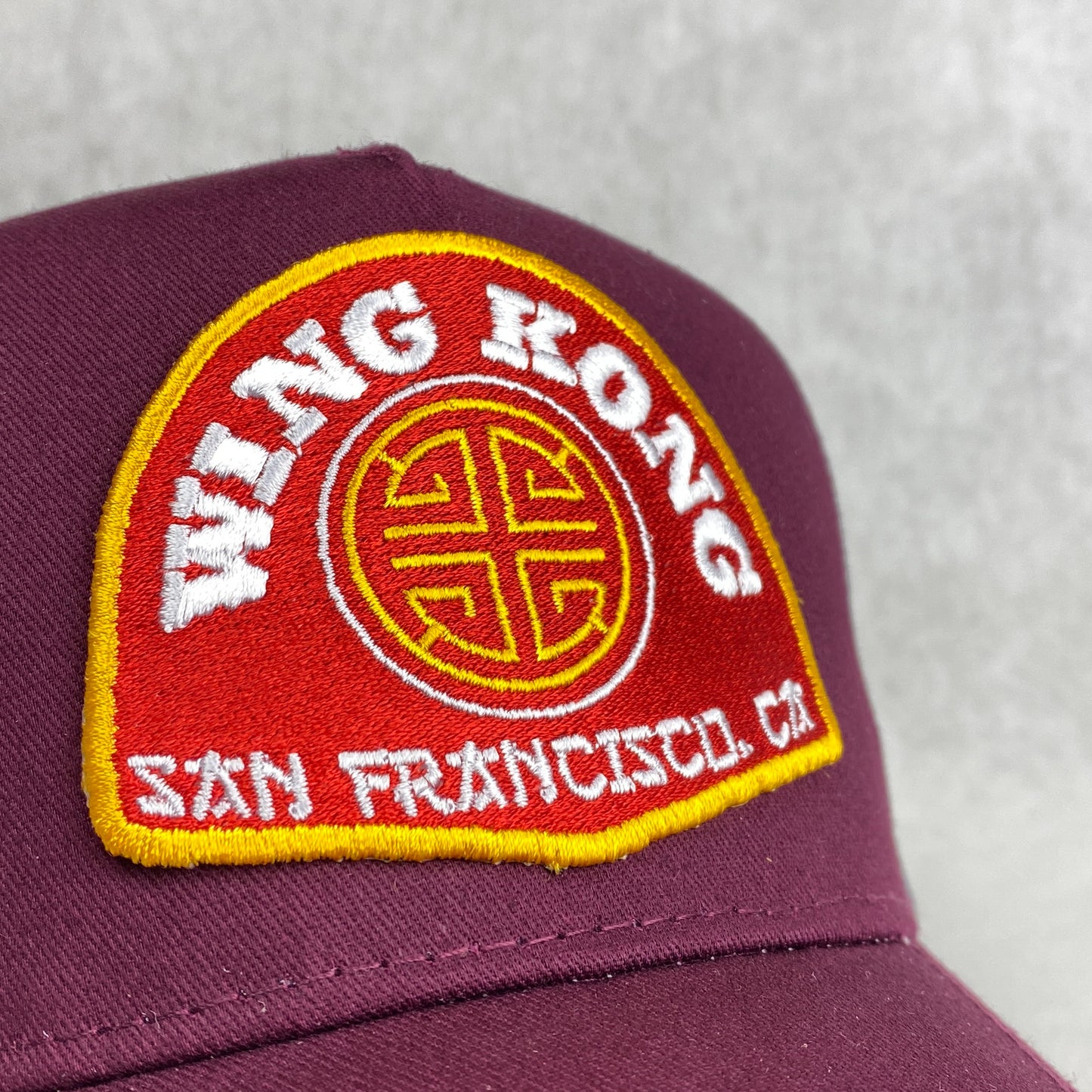 Wing Kong Trading embroidered retro trucker cap
