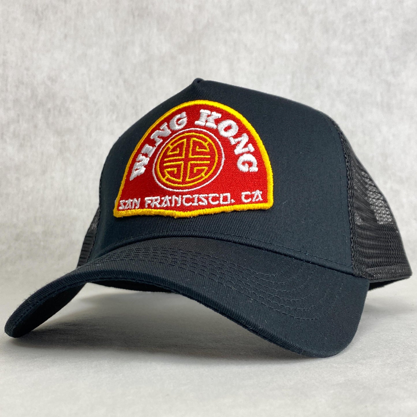 Wing Kong Trading embroidered retro trucker cap